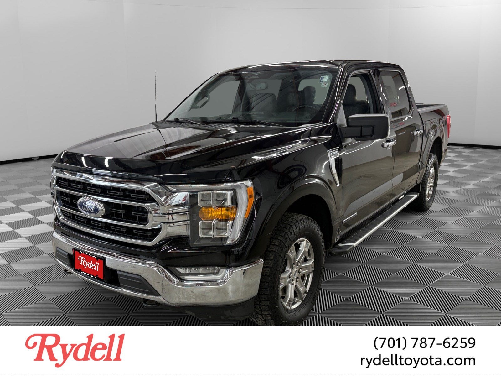 2023 Ford F-150 XLT in Agate Black Metallic — front three-quarter view