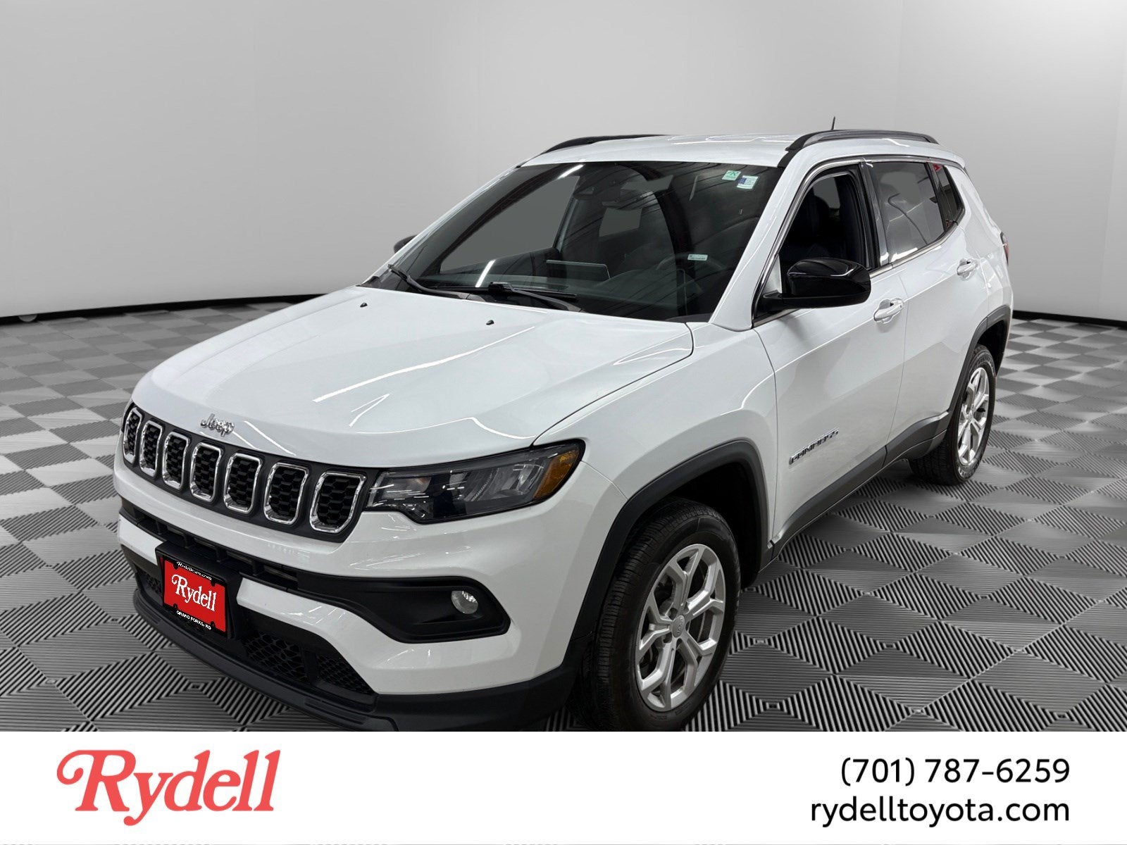 2024 Jeep Compass Latitude in Bright White Clearcoat — front three-quarter view