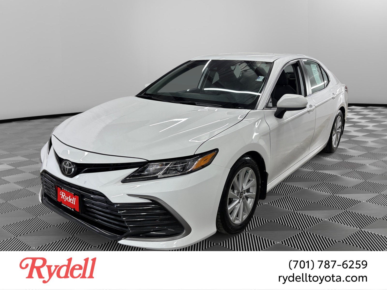 2022 Toyota Camry LE in Ice Cap White — front three-quarter view
