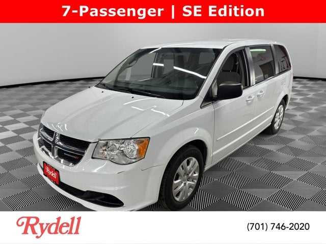 2017 Dodge Grand Caravan SE in White Knuckle Clearcoat — front three-quarter view