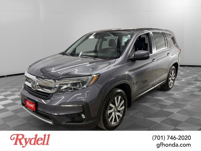 2022 Honda Pilot EX-L in Modern Steel Metallic — front three-quarter view