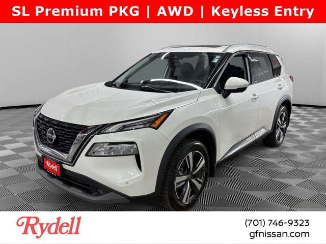 2021 Nissan Rogue SL in Pearl White Tricoat — front three-quarter view