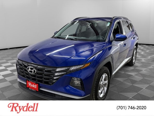 2024 Hyundai Tucson SEL in Intense Blue — front three-quarter view