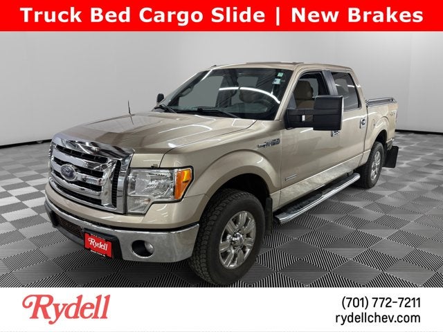 2011 Ford F-150 XLT in Kodiak Brown — front three-quarter view