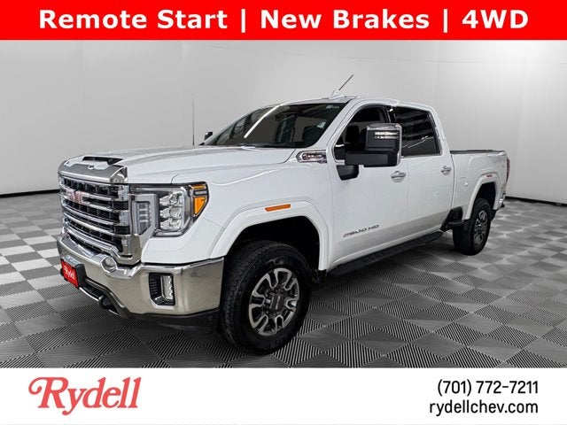 2023 GMC Sierra 2500HD SLT in Summit White — front three-quarter view