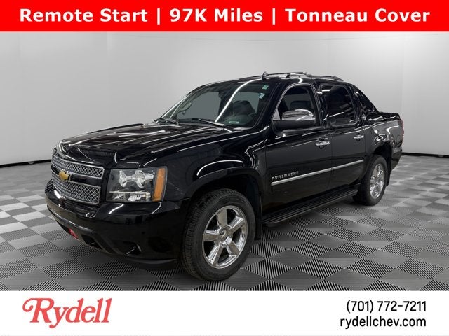 2013 Chevrolet Avalanche LTZ in Black — front three-quarter view