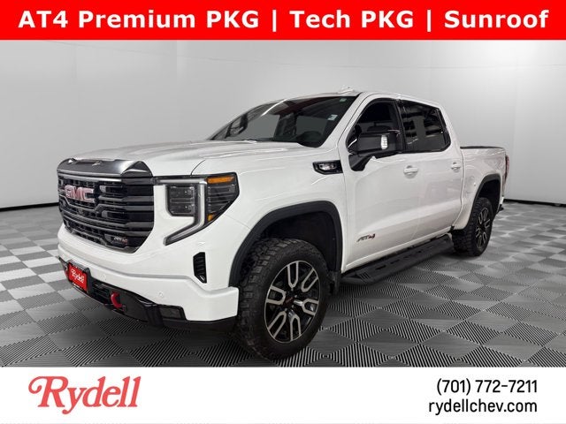 2024 GMC Sierra 1500 AT4 in Summit White — front three-quarter view