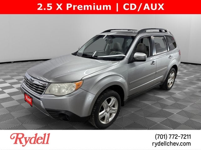 2009 Subaru Forester X w/Prem/All-Weather in Steel Silver Metallic — front three-quarter view